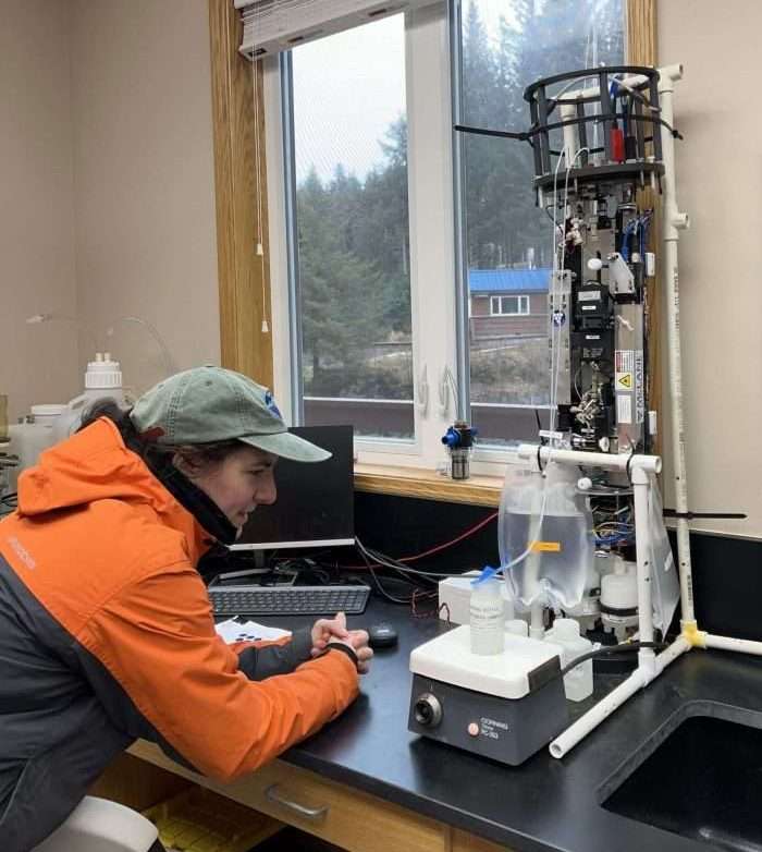 IMG_8634 Researcher tests inflow cytobot by running a phytoplankton sample.