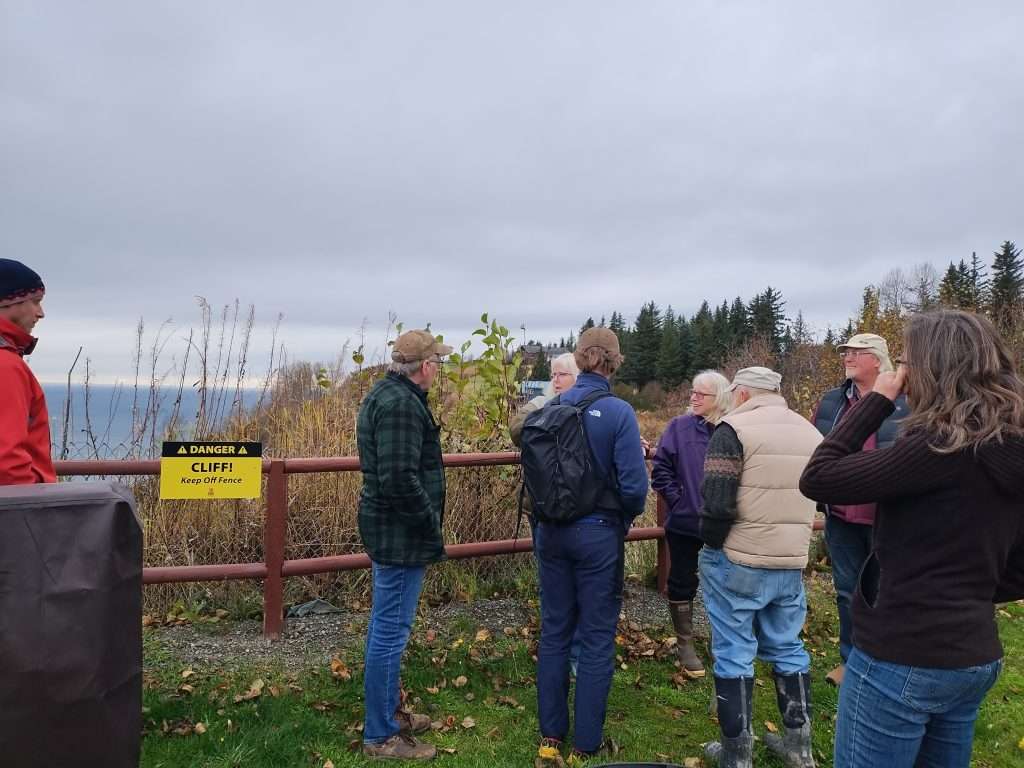Workshop participants gather at bluff
